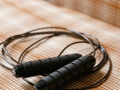 Detailed shot of a stopwatch and a jumping rope